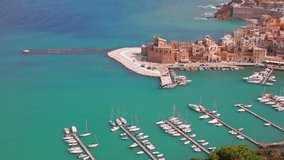 Bird's eye cityscape of Castellammare del Golfo port. Sunny spring seascape of Mediterranean sea, Sicily, Italy, Europe. Full HD video (High Definition).