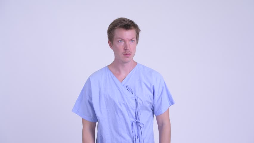 Portrait of stressed young man patient looking frustrated while stopping something