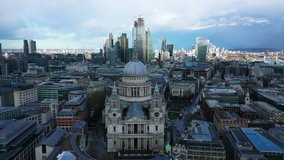 Aerial drone video of iconic Saint Paul landmark Cathedral in the heart of City financial district of London, United Kingdom