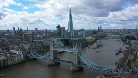 Aerial drone video of iconic Tower Bridge in the heart of City of London, United Kingdom