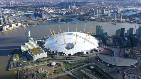 Greenwich Peninsula, London / United Kingdom - March 18 2019: Aerial drone bird's eye view of iconic concert Hall of O2 Arena