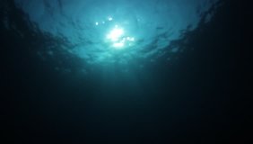 Underwater blue background in ocean 