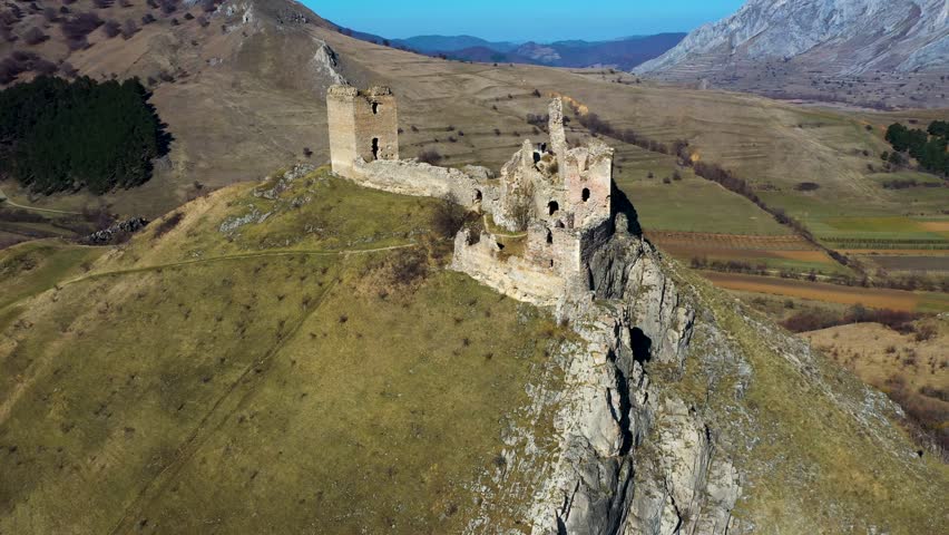 Aerial 4k drone view of medieval fortress, Thoroczkay, in Transylvania, Romania