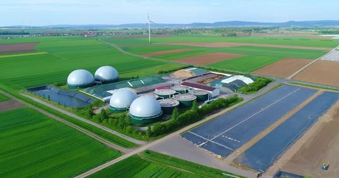 A Modern Plant In A Green Field, Safe energy, green energy production, renewable energy, biogas production. A Modern Plant In A Green Field