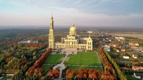 Sanctuary and Basilica of St Mary of Liche? in small village Lichen. The biggest church in Poland, one of the largest in the World. Famous Catholic pilgrimage site. Aerial 4K approaching video in fall