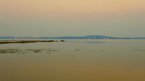 4K time lapse video of Kwan Phayao lake in the evening, Thailand.