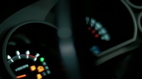 Tachometer and speedometer measure the speed of a fast-driving car, an increase in speed on the dashboard