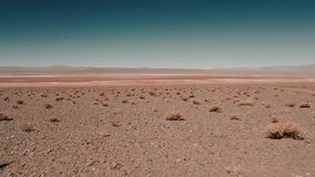 Aerial, Salar De Pocitos, Argentina - cine version. This clip is available in three different gradings - native 10Bit HLG (H265) or flat, cine grading and neutral grading.