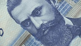 Theodor Herzl on old Israel shekel macro rotating. One of the founders of Zionism. 4K stock video footage