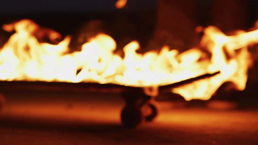 A skateboard on fire. | Shutterstock HD Video #1026293450