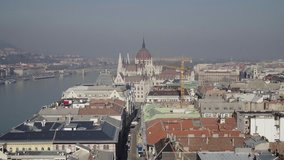 Aerial view of the Parliament building overlooking the Danube in downtown Budapest - 4K drone