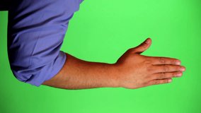 An arm in front of a green screen to be keyed and used at will. Rotate image for best results. Originally used for a few animated whiteboard videos. Hand pushing.