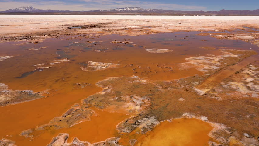 Boiling pond in the salt flat of Uyuni in Bolivia, South America