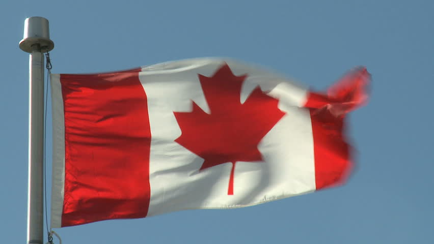 Canadian Flag flying in the breeze