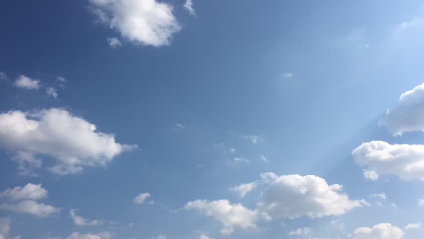 beautiful blue sky with clouds background.Sky clouds.Sky with clouds weather nature cloud blue.Blue sky with clouds and sun. Royalty-Free Stock Footage #1026360101