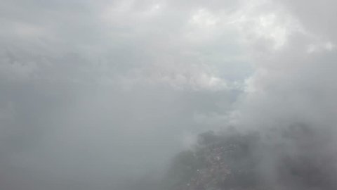 Flight through some fog toward Beatenberg, Switzerland.