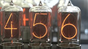 Nixie tube retro electronic clock numbers, cold cathode display, glow discharge