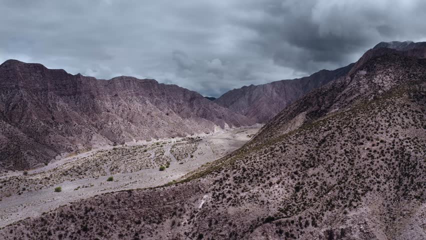 Aerial, Part Of The Andes In Argentina - cine version. This clip is available in three different gradings - native 10Bit HLG (H265) or flat, cine grading and neutral grading.