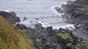Video of rocky sea/ocean coast at Portpatrick on the west coast of Scotland UK