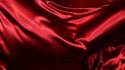 Super slow motion of waving red velvet cloth in detail. Filmed on high speed cinema camera, 1000fps.