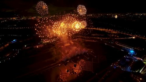 Aerial view of colorful firework in the illuminated Moscow city at night Full HD
