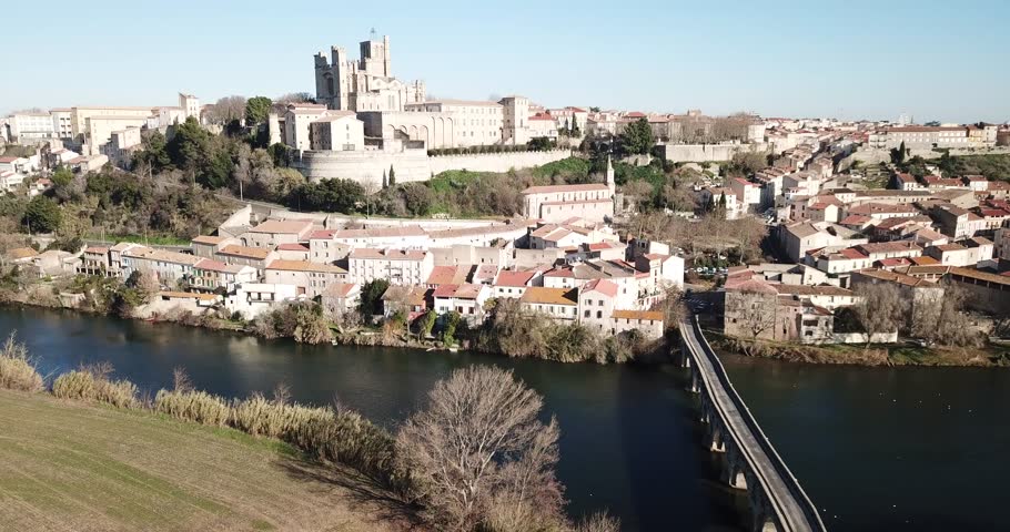 Panoramic view of Old Bridge over Orb and Cathedral of Saint Nazaire, Beziers, France