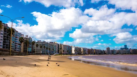MONTEVIDEO, URUGUAY - CIRCA FEBRUARY 2019: Time-lapse view on the Skyline and the Beach in the neighborhood of Pocitos circa February 2019 in Montevideo, Uruguay.

