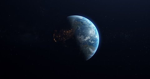 A slow rotation of the Earth, as ites from day to night. Earth rotating on its axis in black space and stars. High detailed, Realistic Animation.