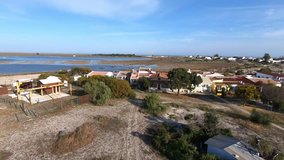 Aerial view. Flight of the drone above the Armona Island. Formosa Estuary  in Algarve, Portugal. Shooting video