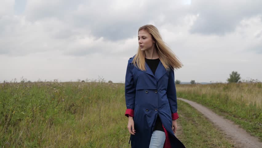 the model goes across the field