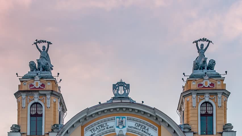 Zoom out Timelapse of Cluj Napoca National Theatre and Opera building in Cluj Napoca, Romania. Architectural style - Neo-baroque. Timelapse in Cluj Napoca, known as Klausenburg and Kolozsvar