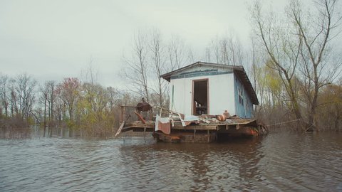 Compilation of abandoned houses in the swamp of Louisiana near New Orleans, filmed by boat in slow motion