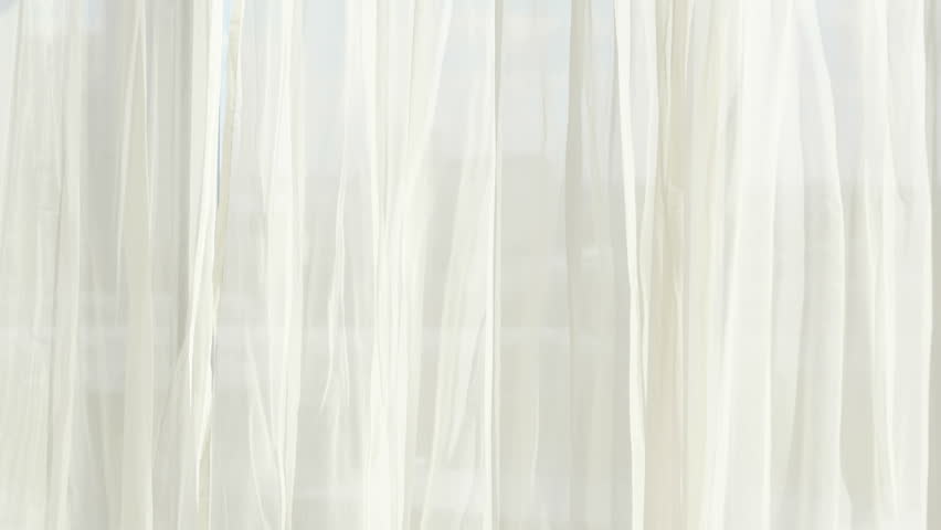 Beautiful happy couple checking out their holiday rental apartment, hugging and kissing at their honeymoon vacation. 4K