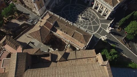 Top angle drone shot of Palazzo Senatorio, Campidoglio and Fontana della Dea Roma and Gemonian Stairs. Rome.