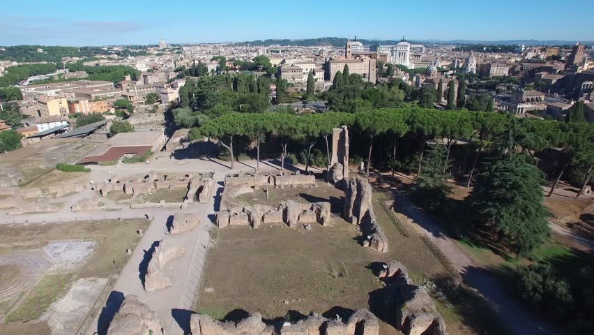 Aerial fly around over the ruins of Domus Flavia (Flavian Palace) and the Palatine Hill. Rome.