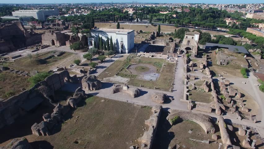 Aerial fly around over the ruins of Domus Flavia (Flavian Palace) and the Palatine Hill. Rome.