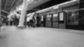 Blurry motion pictures video timelapse of crowded people moving in-out on train station in Bangkok Thailand and everyone move fast in rush hour to working or go back home and static camera on tripod