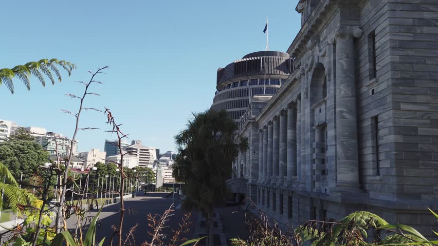 Side shot of New Zealand Parliament building and Beehive Government building in Capital Wellington City 4k