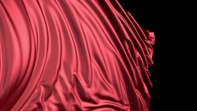 Red silk in slow motion. The fabric develops smoothly in the wind. Wind waves spread through the fabric. This version of the fabric in smooth motion is suitable for almost any video