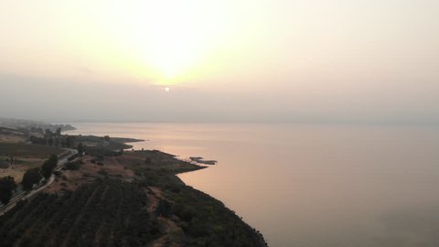 Beautiful drone shot at sunrise over the Sea of Galilee. This is near the location where Christians believe Jesus called His disciples