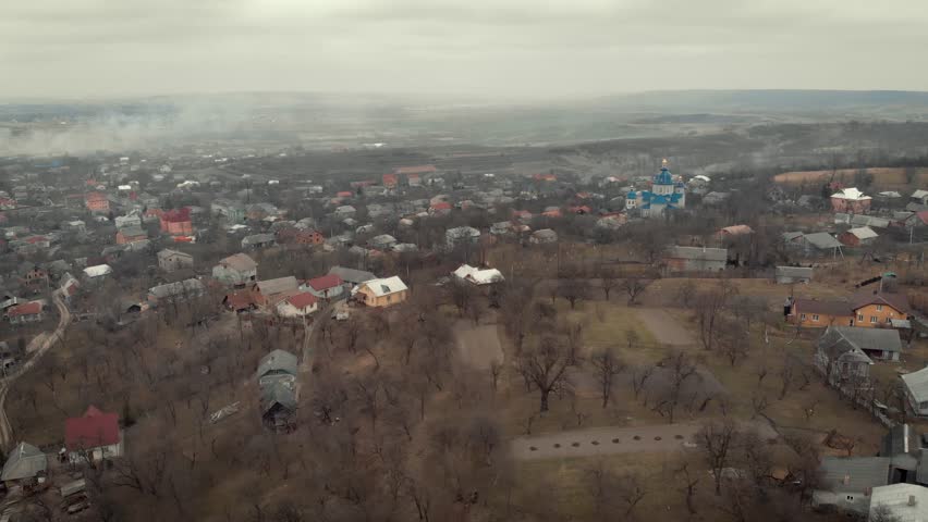 Smoke near the village. Fire in the field. The threat of ecology. burn grass 4k