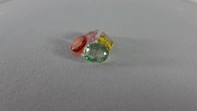 Video of rotating gems. Natural stones, color natural gemstones