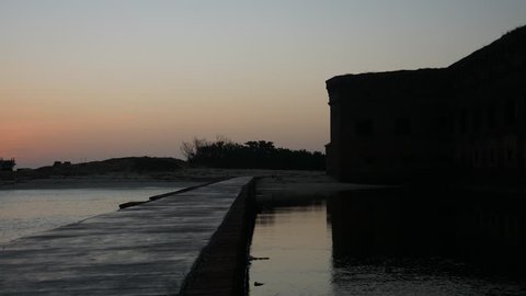 Landscape view of the moat outside of Fort Jefferson just before sunrise in Dry Tortugas National Park (Florida).