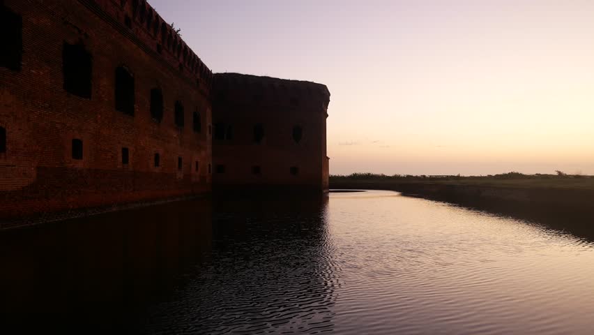 Landscape view of the moat outside of Fort Jefferson just before sunrise in Dry Tortugas National Park (Florida).