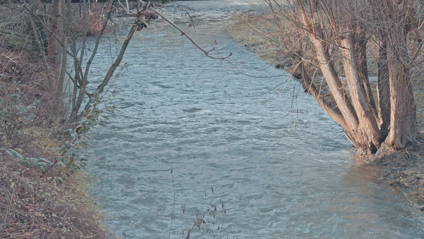 White mountain stream water falling down. Bursting ecology background