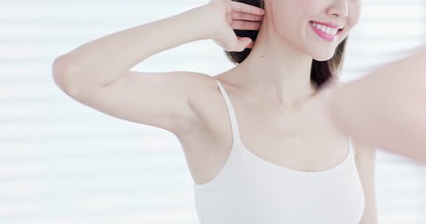 beauty woman smile happily with armpit - hair removal concept