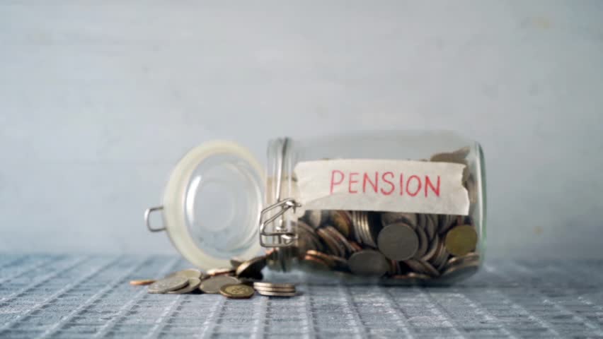 Slow motion coins money dropped from glass jar with pension label, financial concept. | Shutterstock HD Video #1026483968