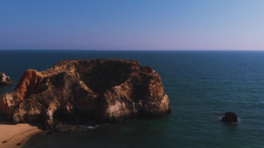 Movie take from Algarve in Portugal with Drone. Landscape for Rocks and Sea