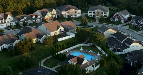 This Ultra High Definition drone aerial footage is of a suburban community in Pennsylvania. The footage is a still UHD photo that zooms out.
