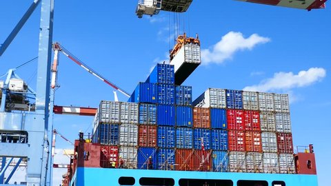 Haifa, Israel - 27.3.2019 : Cargo container ship loading by crane